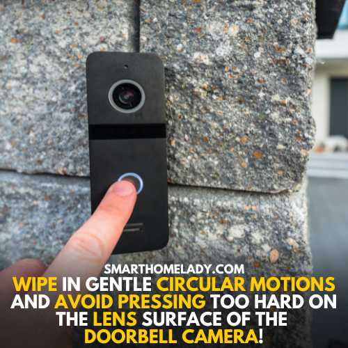 Clean lens of eufy doorbell